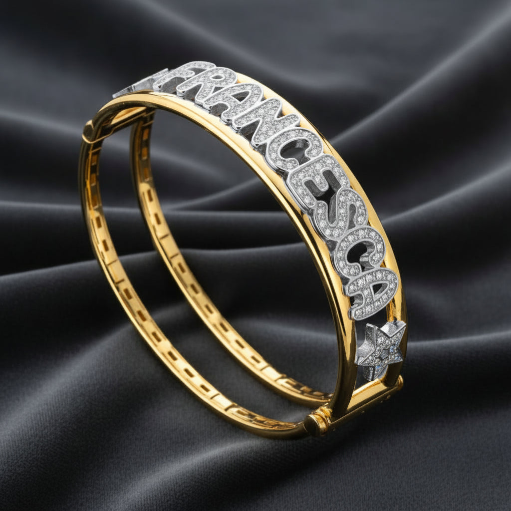 Varianti di colore manetta rigida ArtMID: argento rodiato, oro giallo e oro rosa con scritte in zirconi.