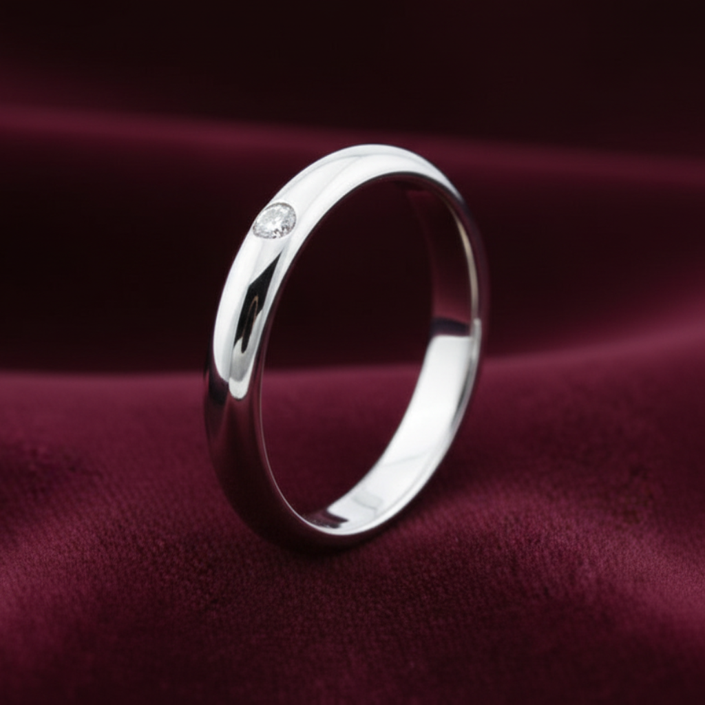 Fede nuziale ArtMID in oro bianco 18kt con diamante naturale 0.03 carati peso 3 grammi. alzata