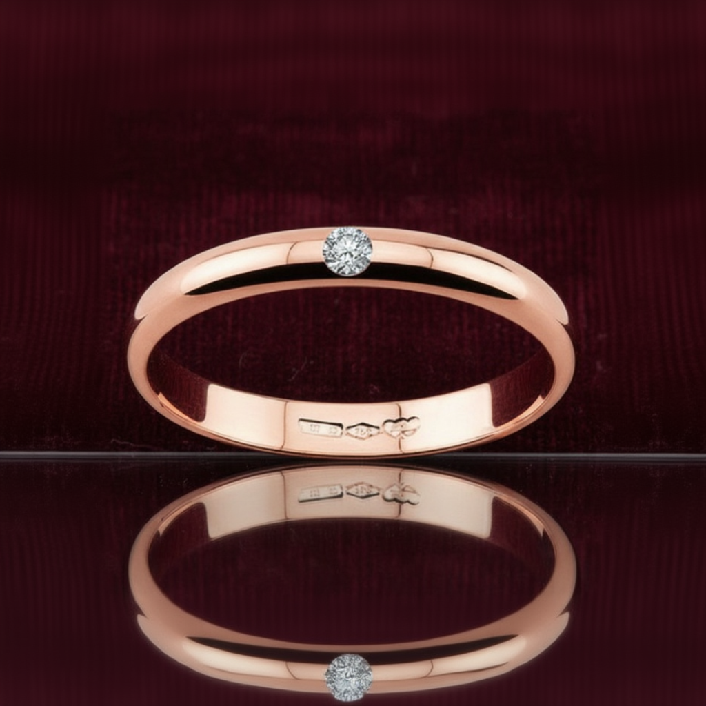 Fede nuziale ArtMID in oro rosa 18kt con diamante naturale 0.03 carati peso 3 grammi.