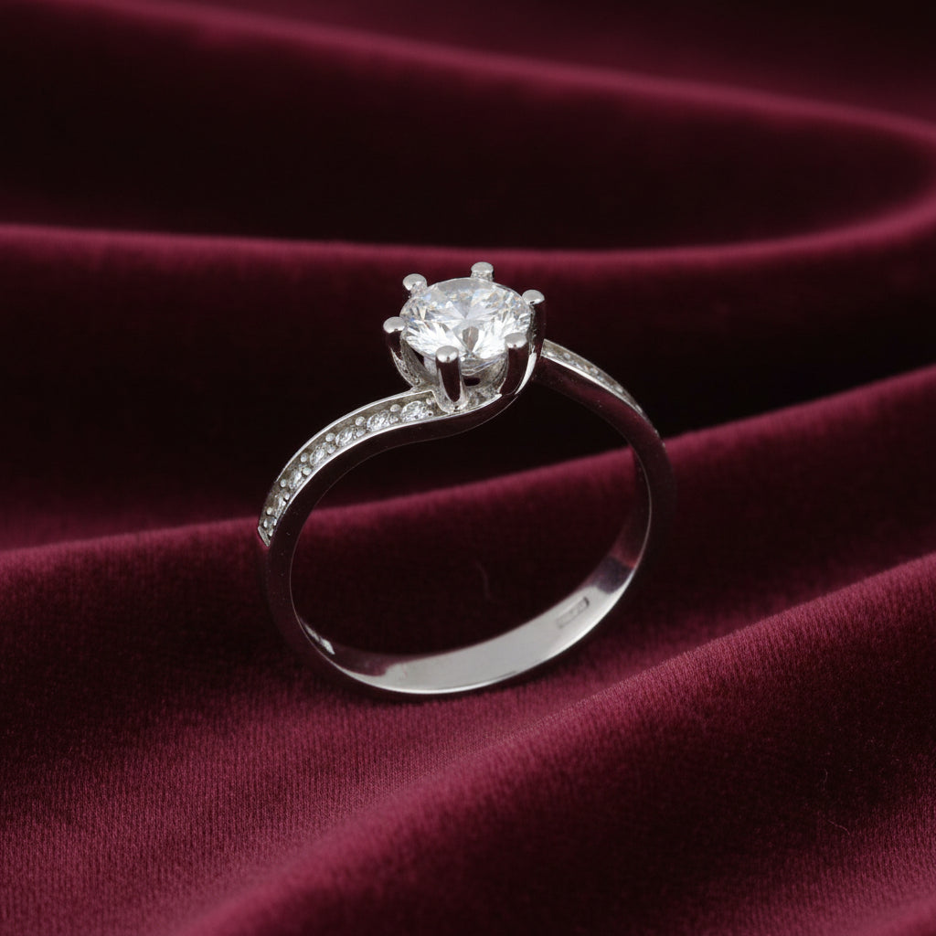 Anello solitario in oro bianco 18kt peso 3,69g con zircone centrale Art MID Gioielli.