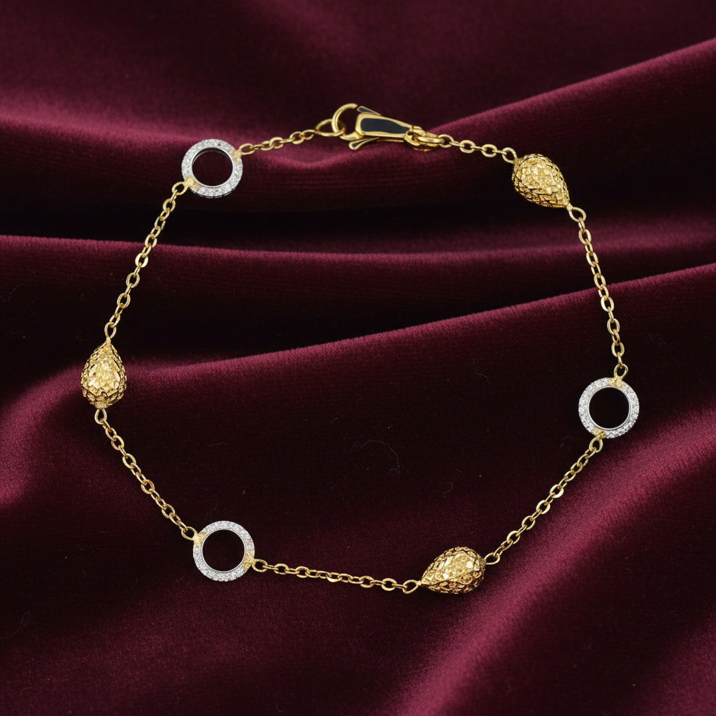 Bracciale in oro 18kt con soggetti martellati Art MID Gioielli.