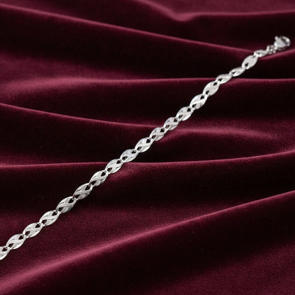 Bracciale in oro bianco 18kt con riportini Art MID Gioielli.