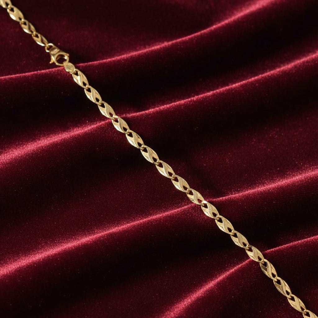Bracciale in oro giallo 18kt con riportini Art MID Gioielli.