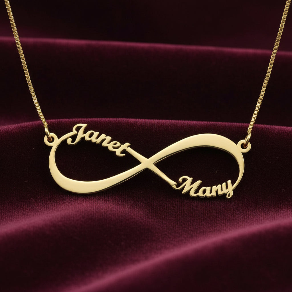 Collana simbolo infinito con nomi in oro giallo 18kt Art MID Gioielli.