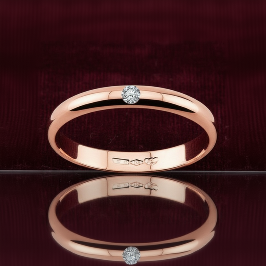 Fede nuziale ArtMID in oro rosa 18kt con diamante naturale 0.03 carati peso 3 grammi.