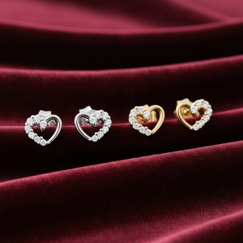 Orecchini a forma di cuore con zirconi in 18kt Art MID Gioielli.